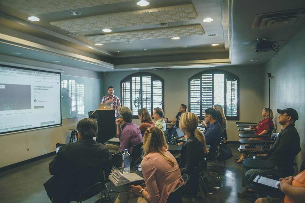 Higher education faculty in executive discussion